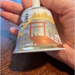 Vintage Kiyomasa Japan porcelain bell, gold trim, Japanese Scene, house/river.